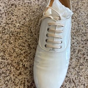 White patent leather shoes